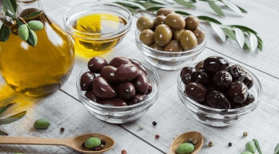 wellhealthorganic.com:11-health-benefits-and-side-effects-of-olives-benefits-of-olives